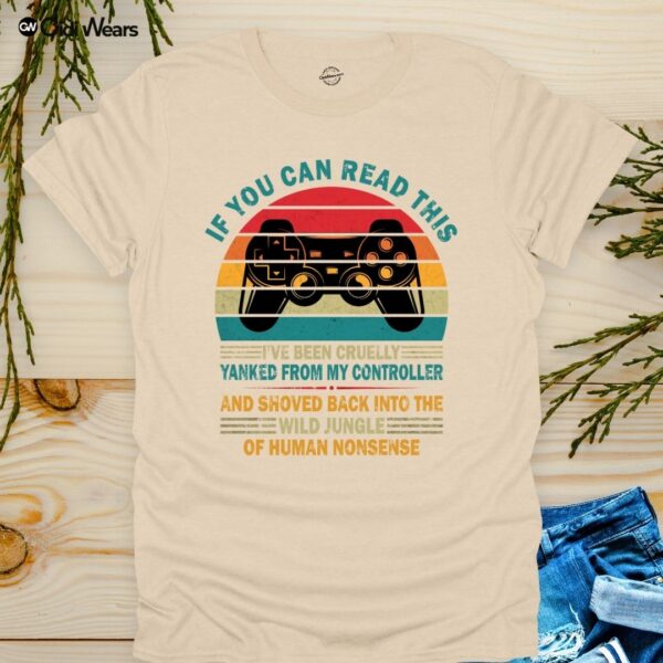 Funny gamer dog lover t-shirt with text 'If You Can Read This, I've Been Yanked from My Controller' in black on a white tee, perfect for gaming and dog enthusiasts