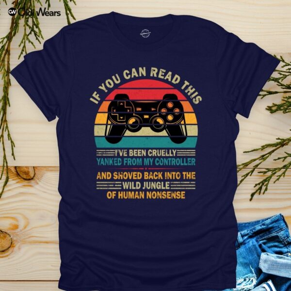 Funny gamer dog lover t-shirt with text 'If You Can Read This, I've Been Yanked from My Controller' in black on a white tee, perfect for gaming and dog enthusiasts
