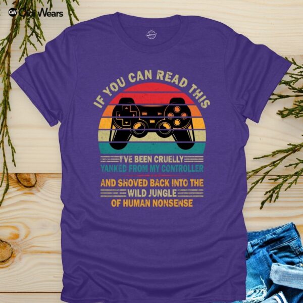 Funny gamer dog lover t-shirt with text 'If You Can Read This, I've Been Yanked from My Controller' in black on a white tee, perfect for gaming and dog enthusiasts