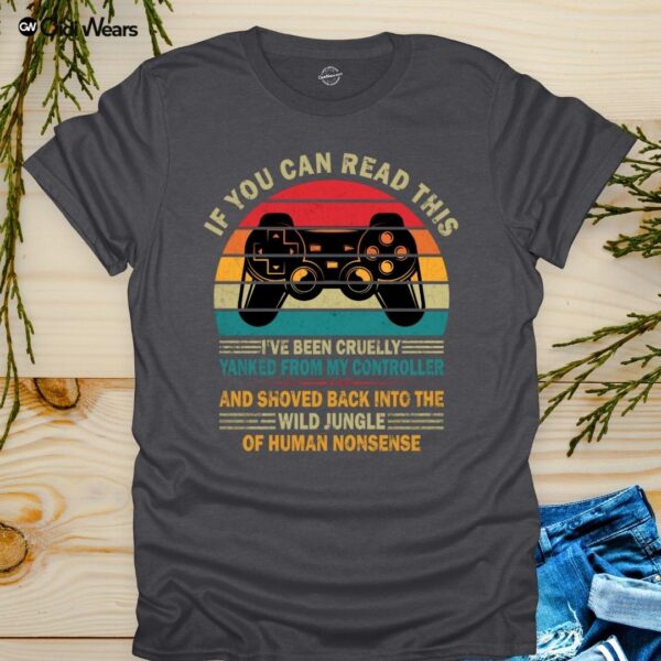 Funny gamer dog lover t-shirt with text 'If You Can Read This, I've Been Yanked from My Controller' in black on a white tee, perfect for gaming and dog enthusiasts